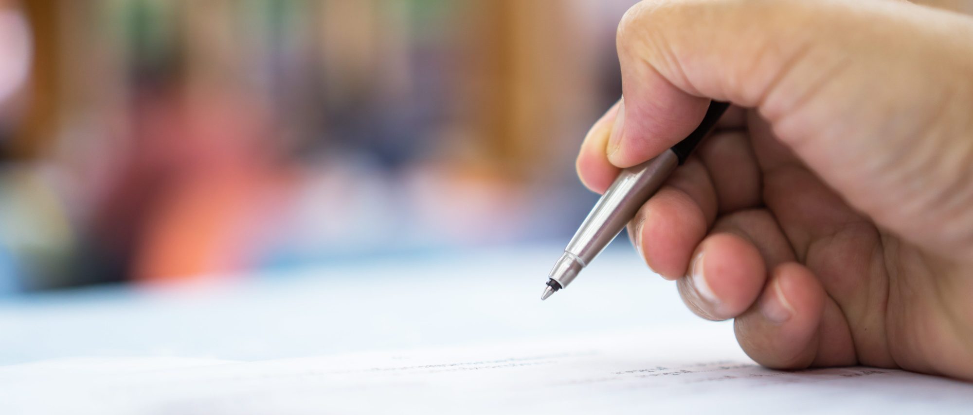 Asian Business man Manager checking and signing applicant filling docs