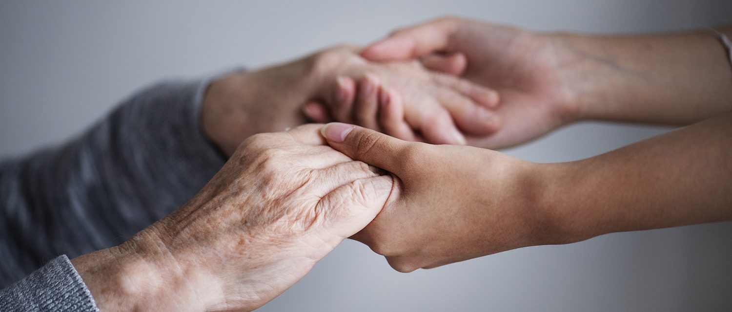 Closeup of supporting hands, for will preparation concept.